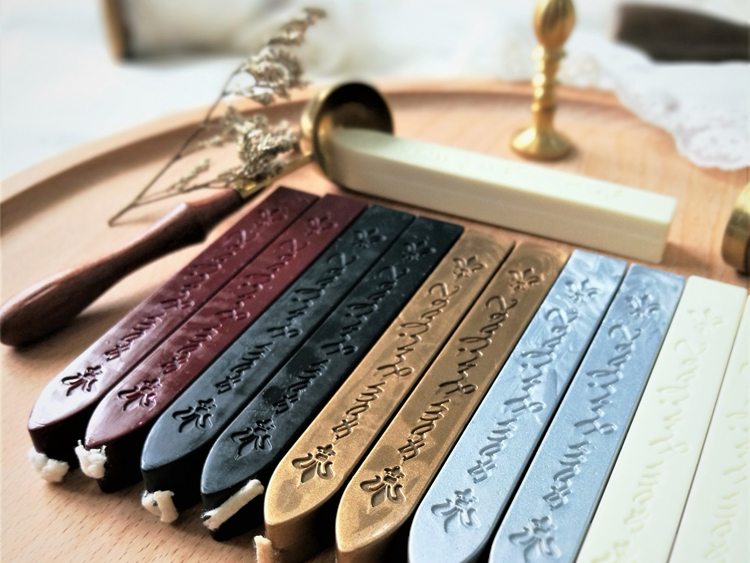 sealing wax sticks with wick, wax seal stamp